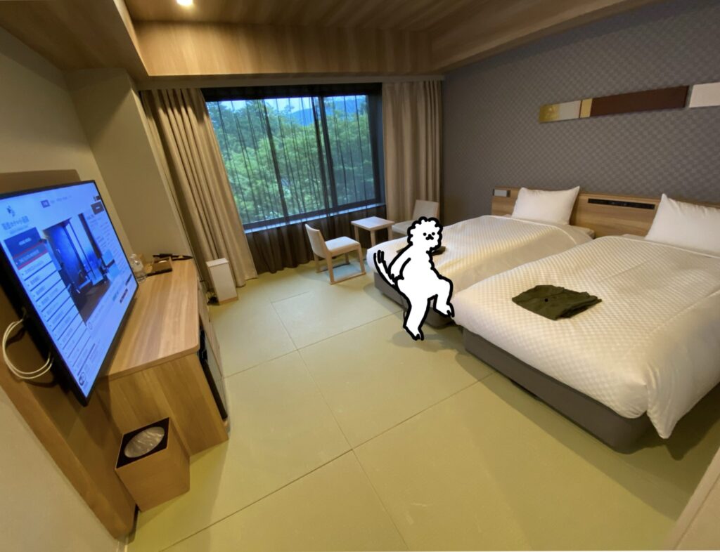箱根ホテル小涌園のお部屋内床が畳のようになっており、ベットもくっつけることが可能だった